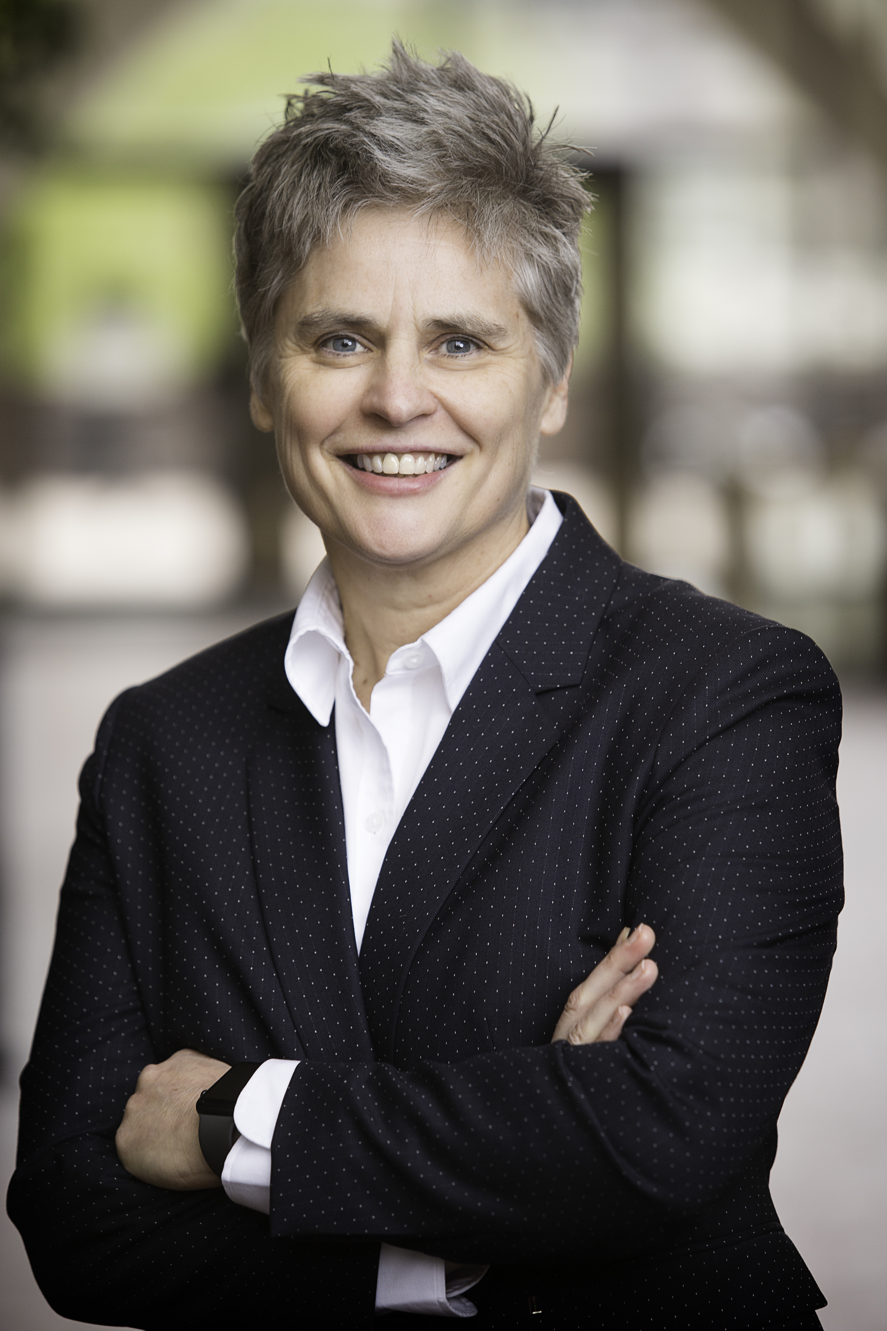 Photograph of Hennepin County Attorney Mary Moriarty smiling with her arms crossed